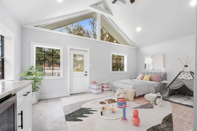 a living room with furniture and window