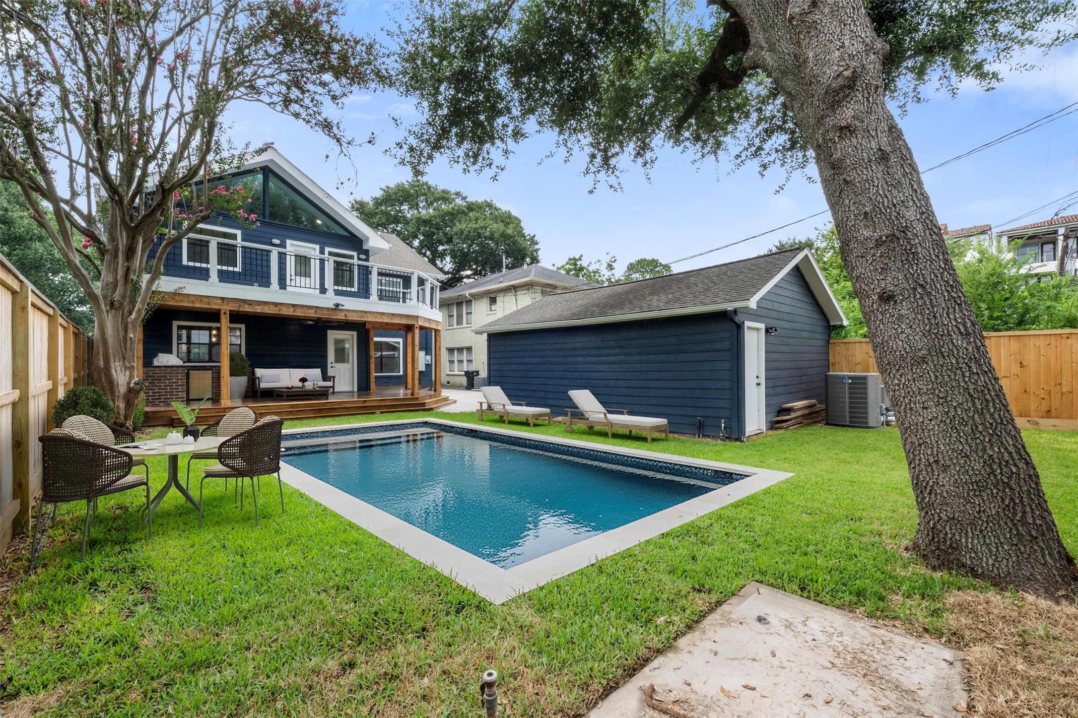 1723 Albans Road Houston, TX 77005 - Photo 41 of 50 a view of house with a yard patio and fire pit
