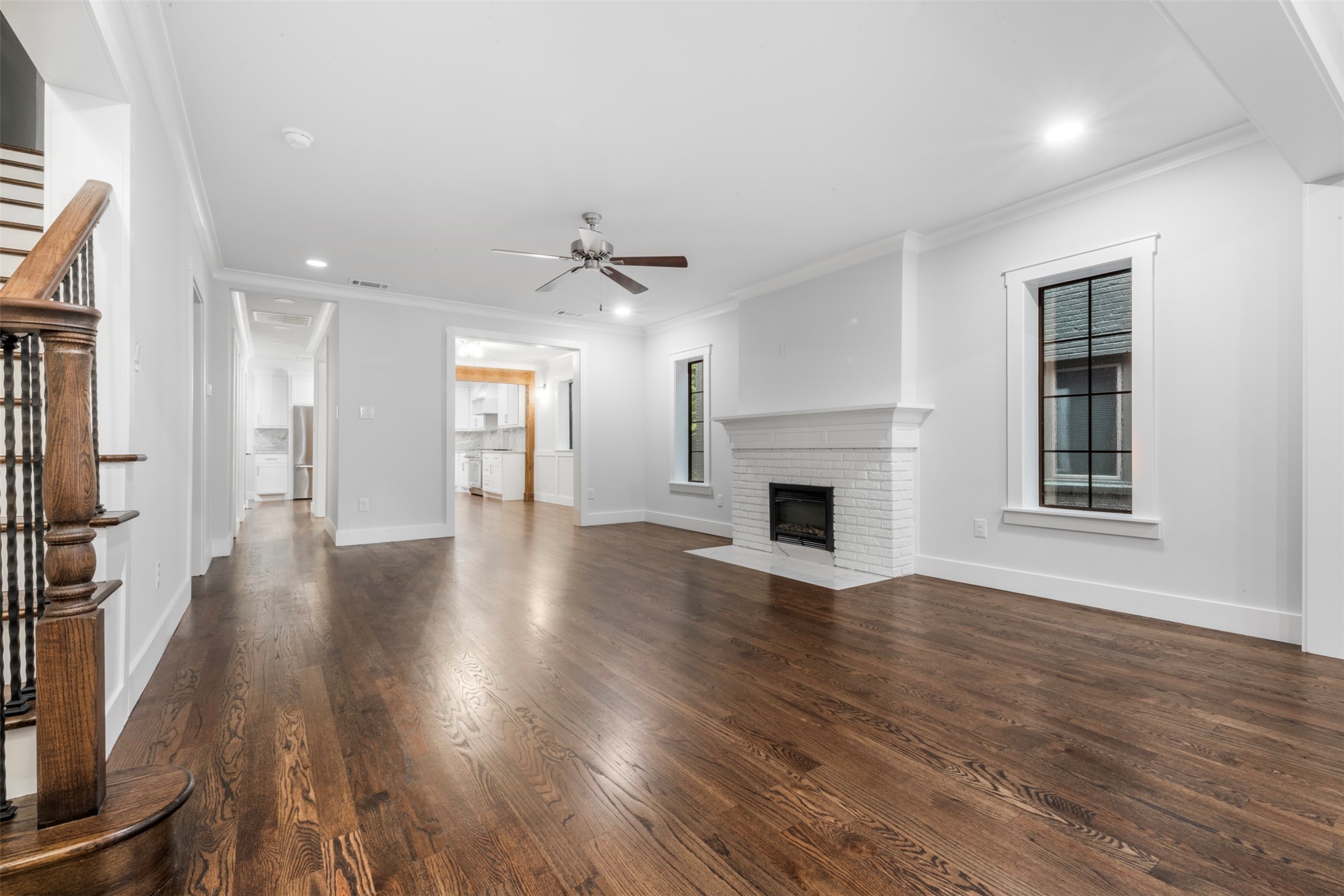 1723 Albans Road Houston, TX 77005 - Photo 5 of 50 a view of a room with wooden floor and fireplace