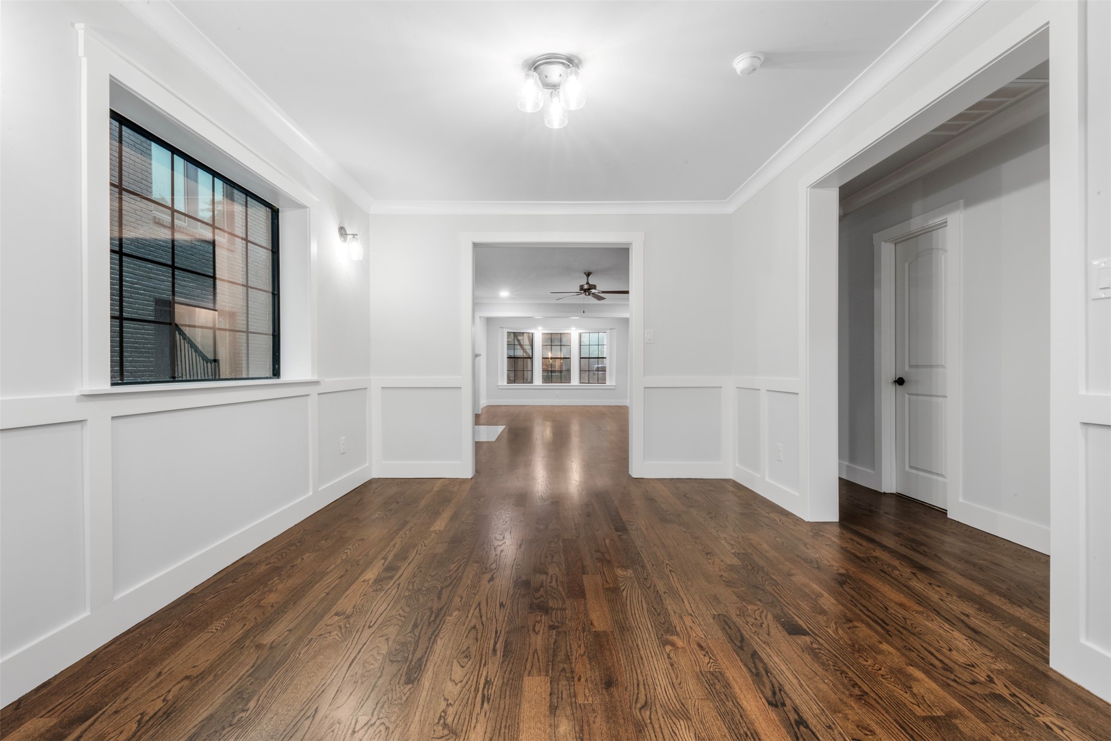 1723 Albans Road Houston, TX 77005 - Photo 7 of 50 wooden floor in an empty room with a window