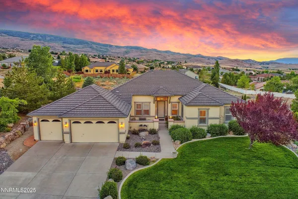 a view of a house with a garden