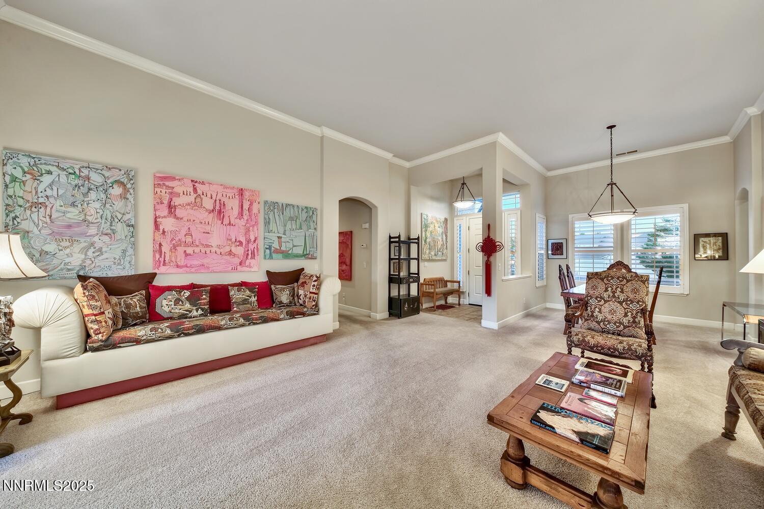 5710 North White Sands Road Reno, NV 89511 - Photo 13 of 35 a living room with furniture and a flat screen tv