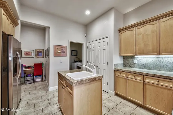 a view of a kitchen with electric appliances