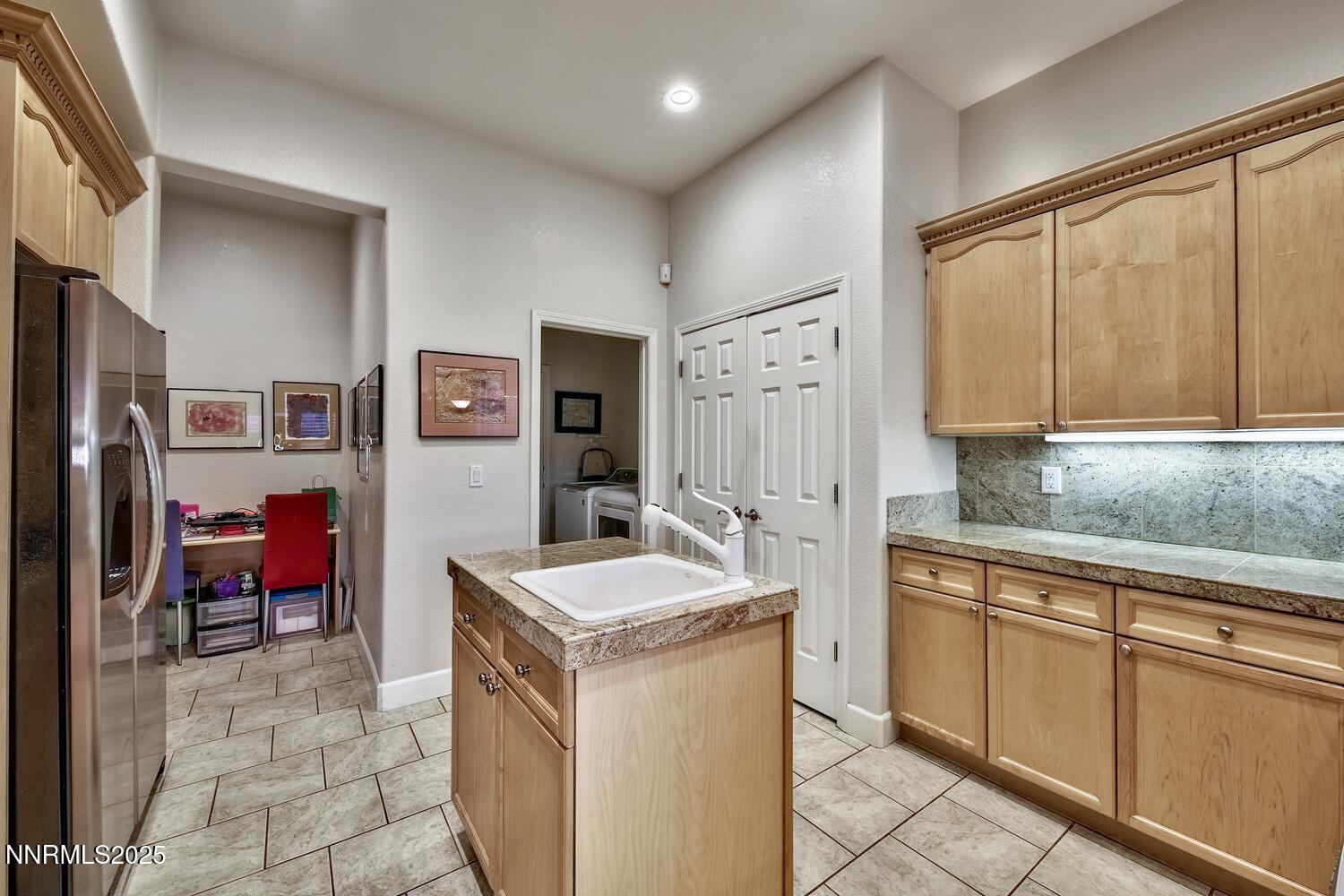 5710 North White Sands Road Reno, NV 89511 - Photo 17 of 35 a view of a kitchen with electric appliances
