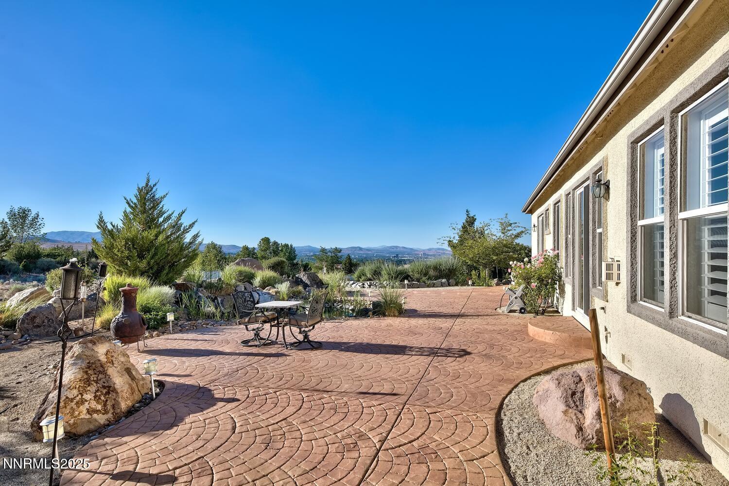 5710 North White Sands Road Reno, NV 89511 - Photo 33 of 35 a view of a backyard with sitting area
