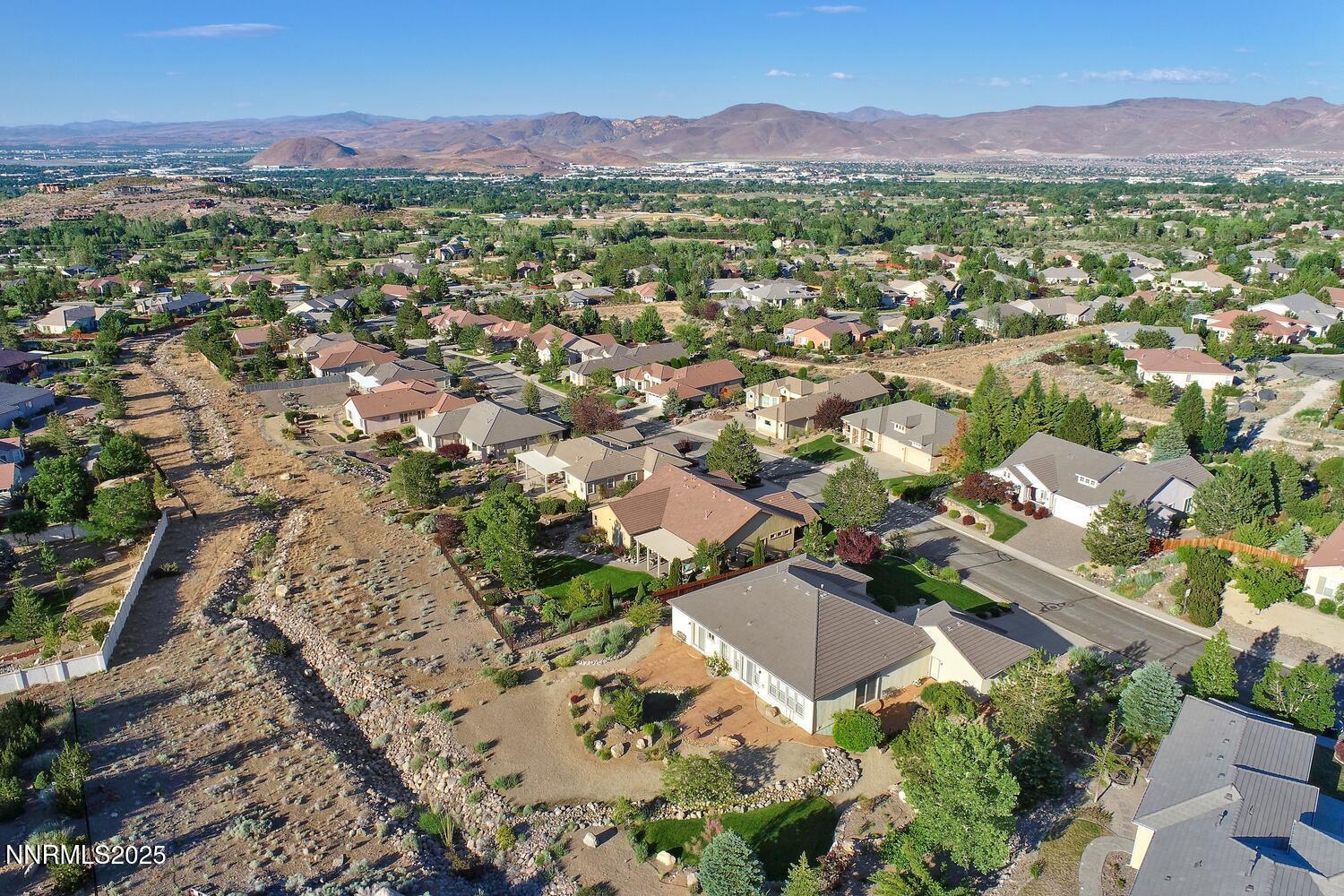 5710 North White Sands Road Reno, NV 89511 - Photo 35 of 35 an aerial view of residential houses with outdoor space