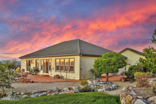 a house view with a garden space