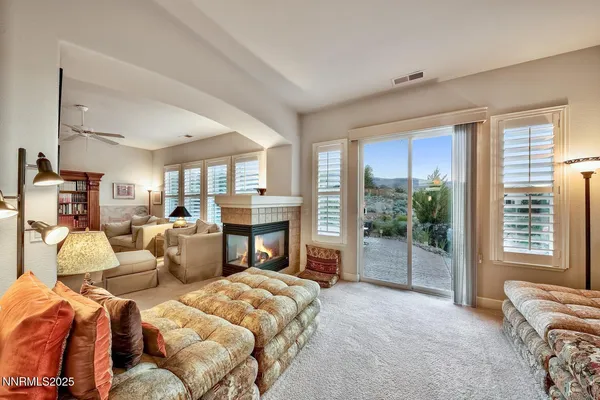 a bed room with bed and balcony