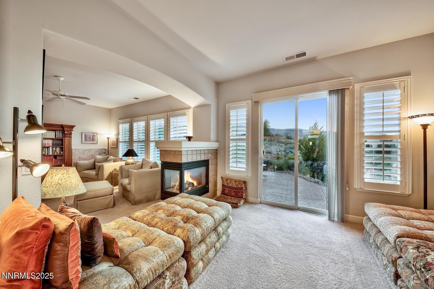 5710 North White Sands Road Reno, NV 89511 - Photo 7 of 35 a bed room with bed and balcony