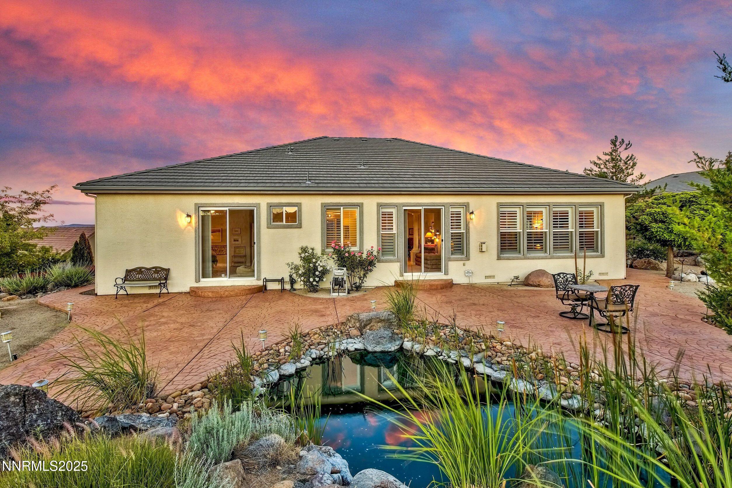 5710 North White Sands Road Reno, NV 89511 - Photo 8 of 35 a view of a house with backyard and sitting area