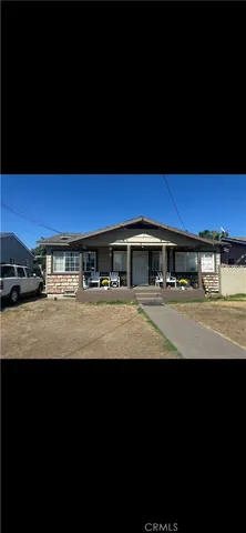 a view of car parked in front of a building