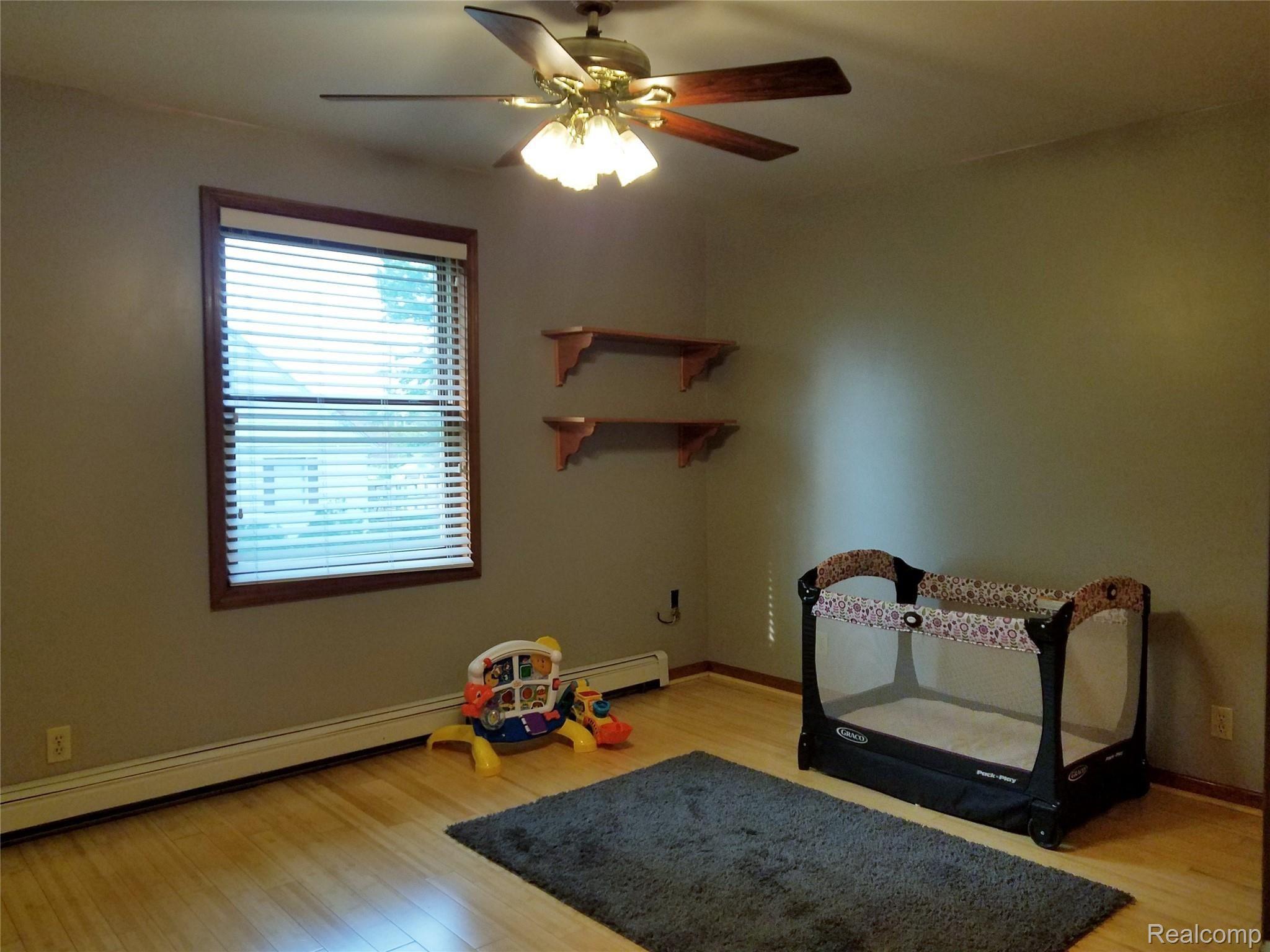 3211 North Belsay Road Flint, MI 48506 - Photo 53 of 62 15x11 Bedroom & Bamboo flooring.jpg