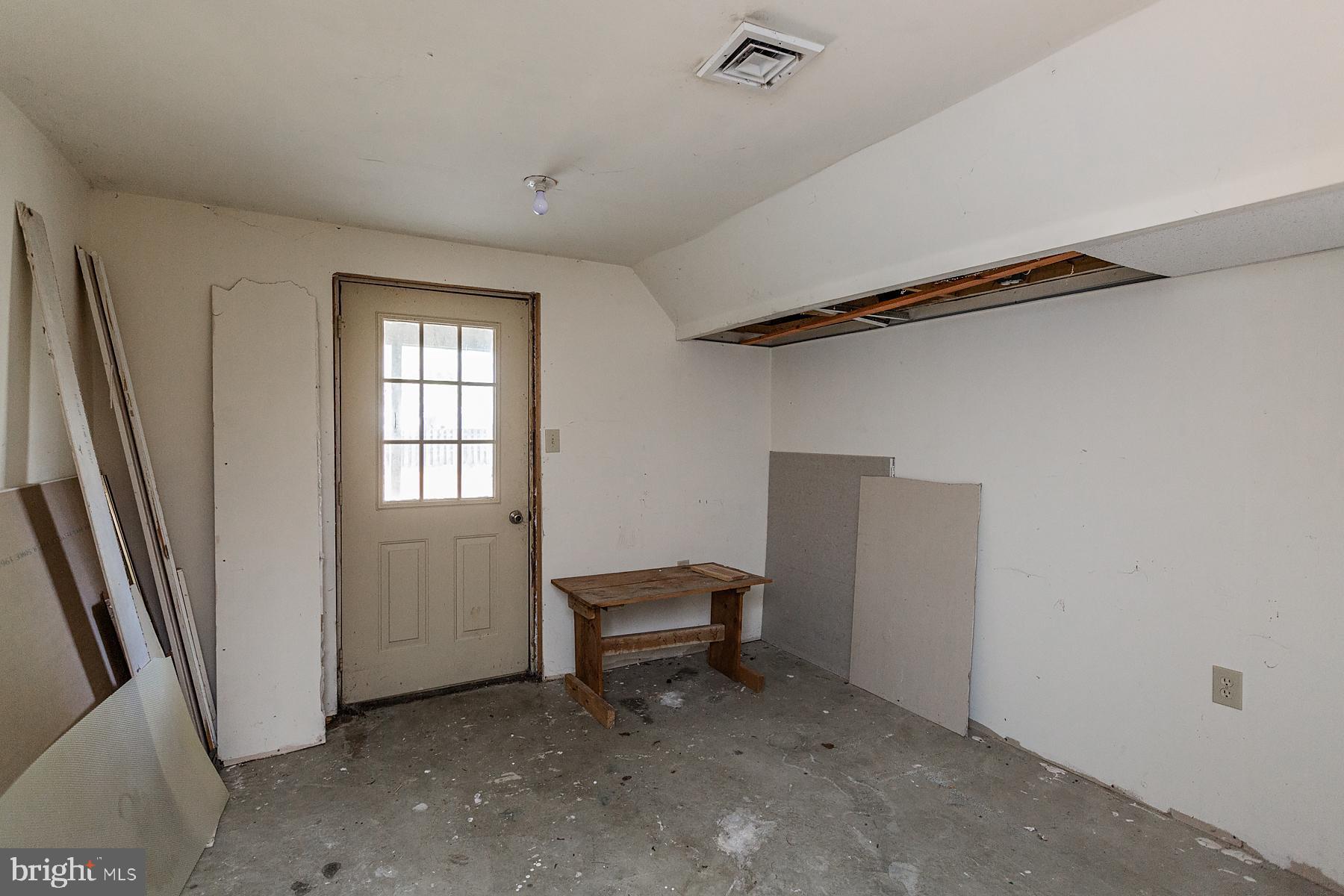 623 South Cedar Street Lititz, PA 17543 - Photo 41 of 46 unfinish space with access to outside back yard