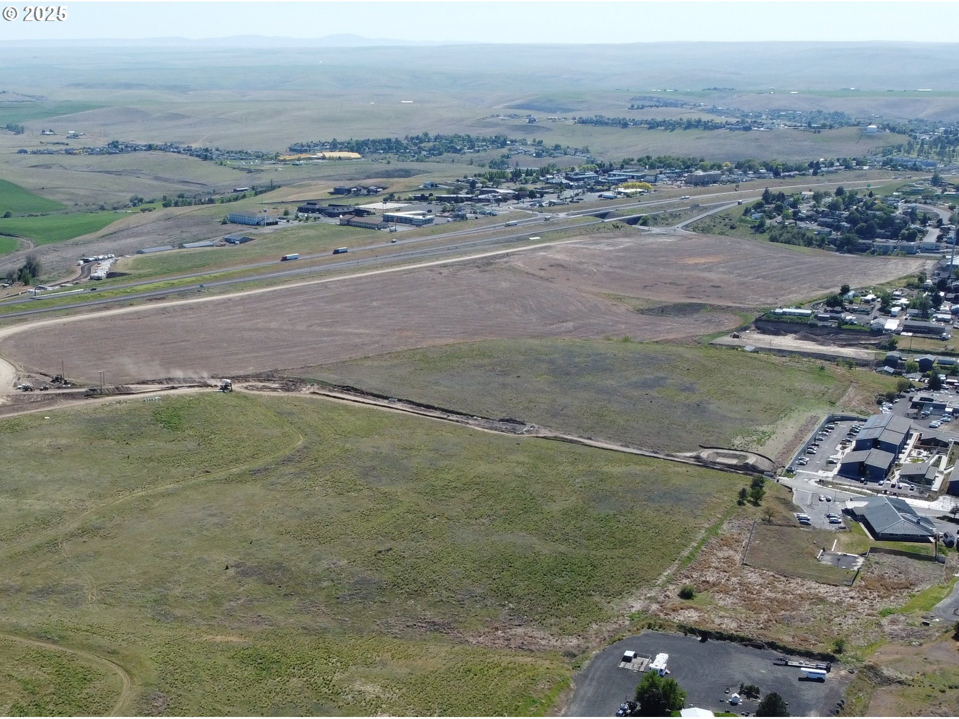 Goad Road, Unit 600 Pendleton, OR 97801 - Photo 4 of 4 an aerial view of a houses