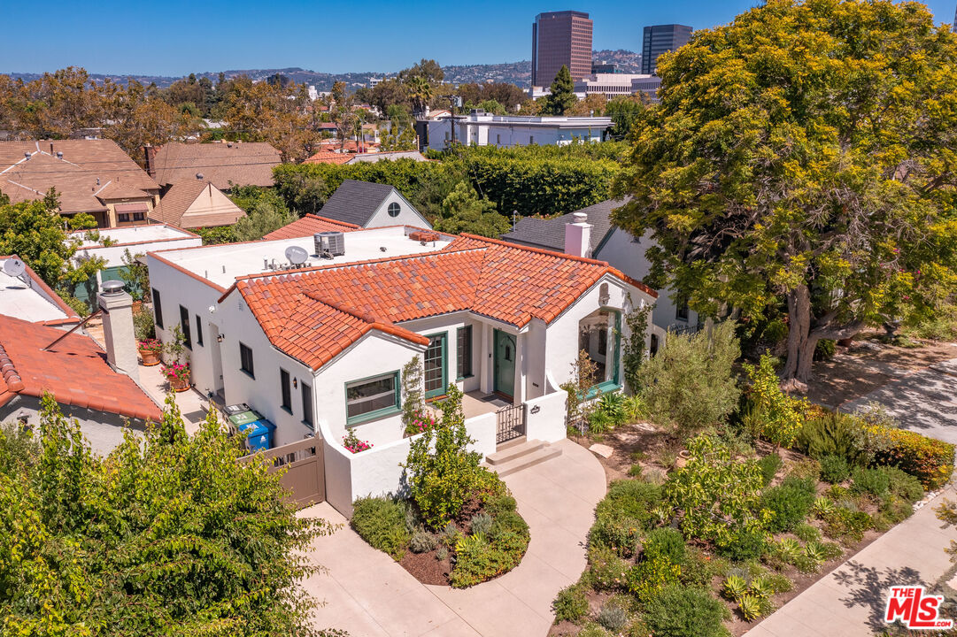 1039 Hi Point Street Los Angeles, CA 90035 - Photo 27 of 27 an aerial view of a house with a yard and fountain