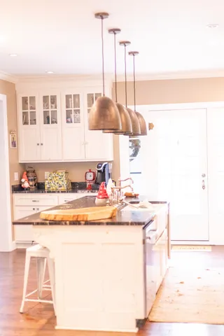 a kitchen with a stove and a microwave