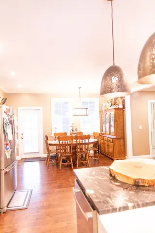 a view of a living room and dining room