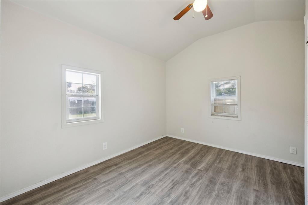 3228 Emmett Street Dallas, TX 75211 - Photo 13 of 25 wooden floor in an empty room
