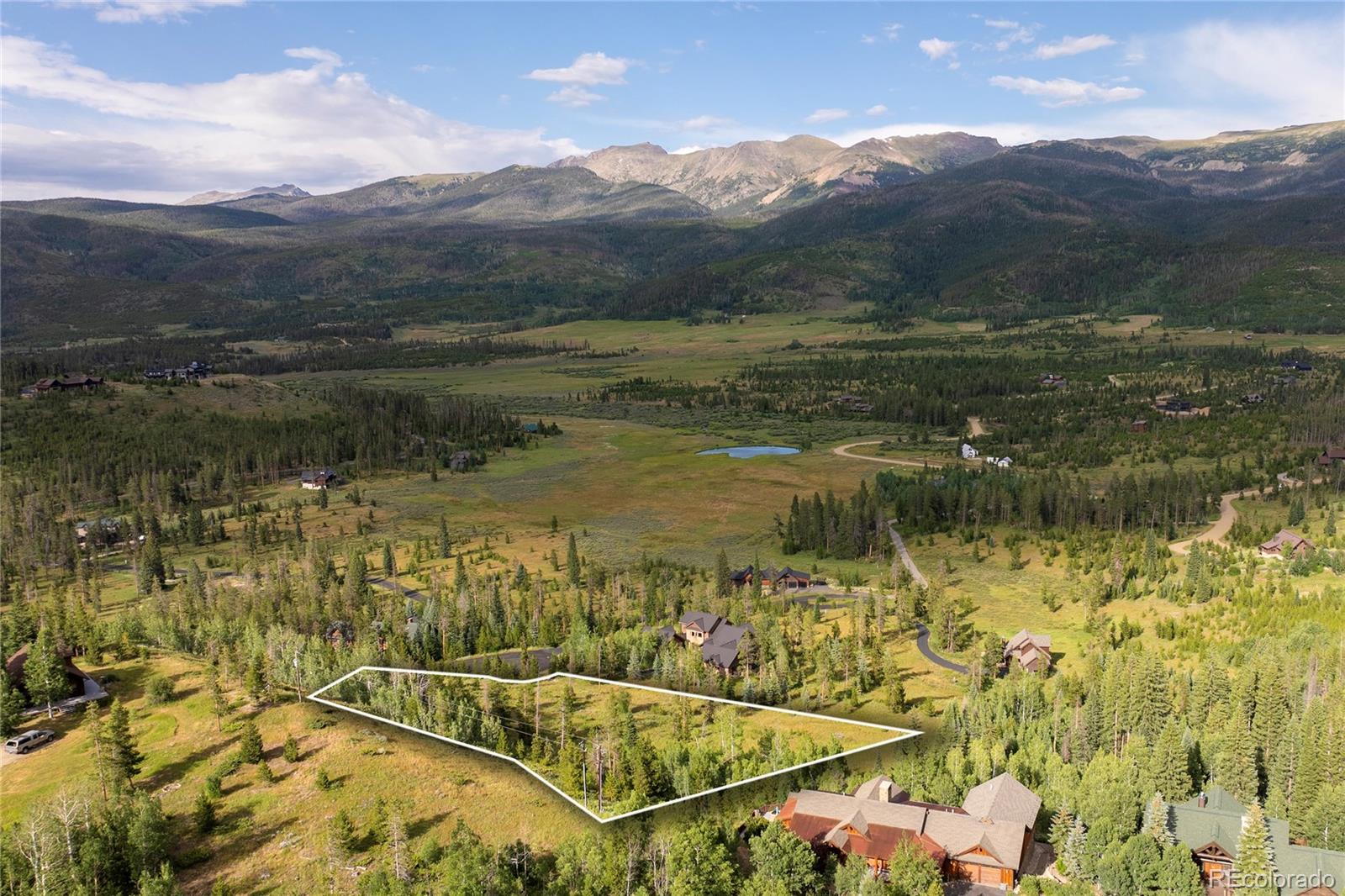 148 Revels Run Tabernash, CO 80478 - Photo 14 of 20 a view of a lake with a mountain