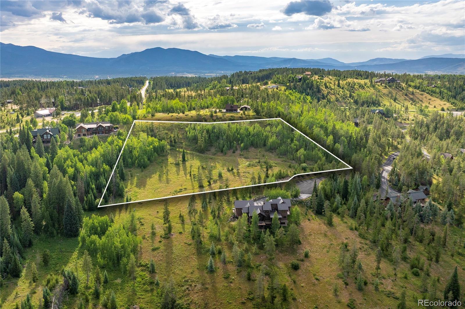 148 Revels Run Tabernash, CO 80478 - Photo 16 of 20 a view of a balcony with an outdoor space and seating