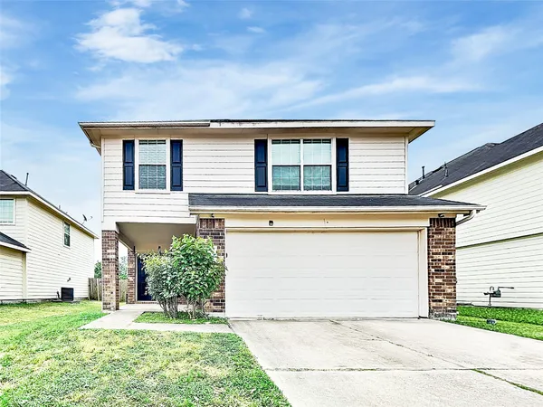 front view of house with a yard