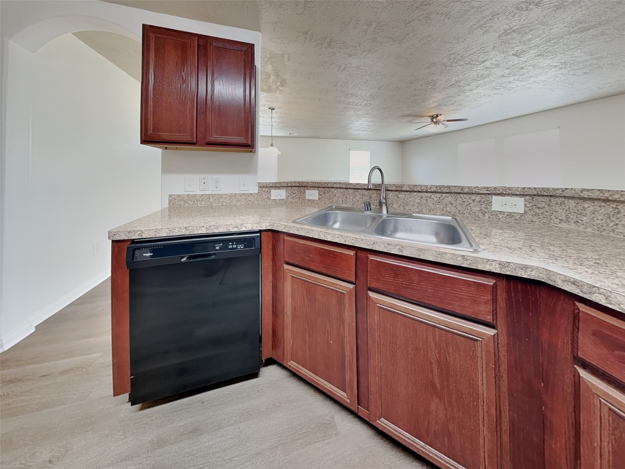 3406 Maris Way Humble, TX 77338 - Photo 3 of 19 a kitchen with a sink and cabinets