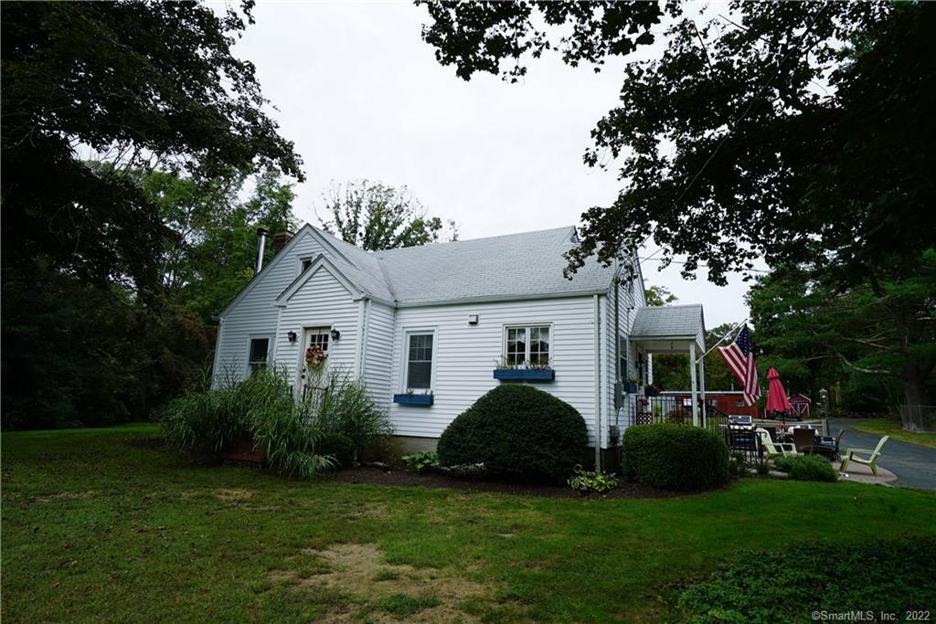 439 Westminster Road Canterbury, CT 06331 - Photo 1 of 1 a front view of house with yard and green space