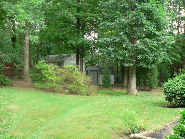 305 Blaine Court Raleigh, NC 27609 - Photo 6 of 7 Large rear yard with a detached storage building.