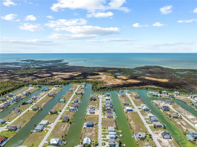 a view of city with ocean