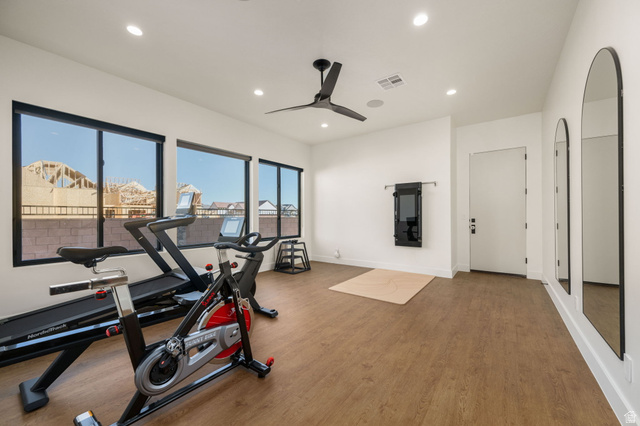 4871 South Homestead Way Washington, UT 84780 - Photo 60 of 151 Workout room featuring ceiling fan, wood finished floors, recessed lighting, and arched walkways