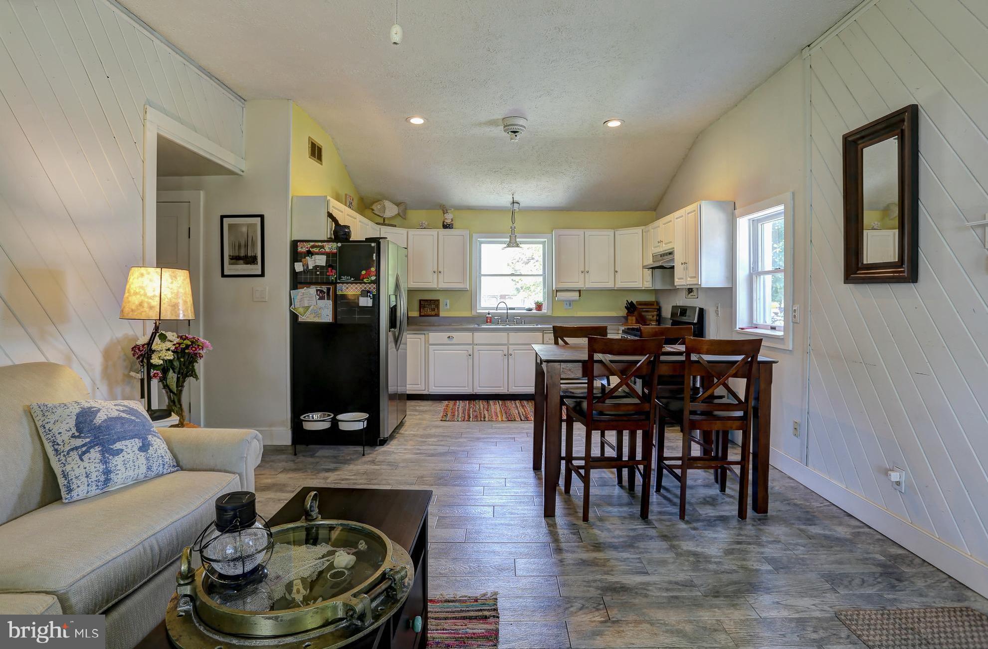 2016 Poplar Ridge Road Pasadena, MD 21122 - Photo 17 of 34 Living room and adjacent dining area