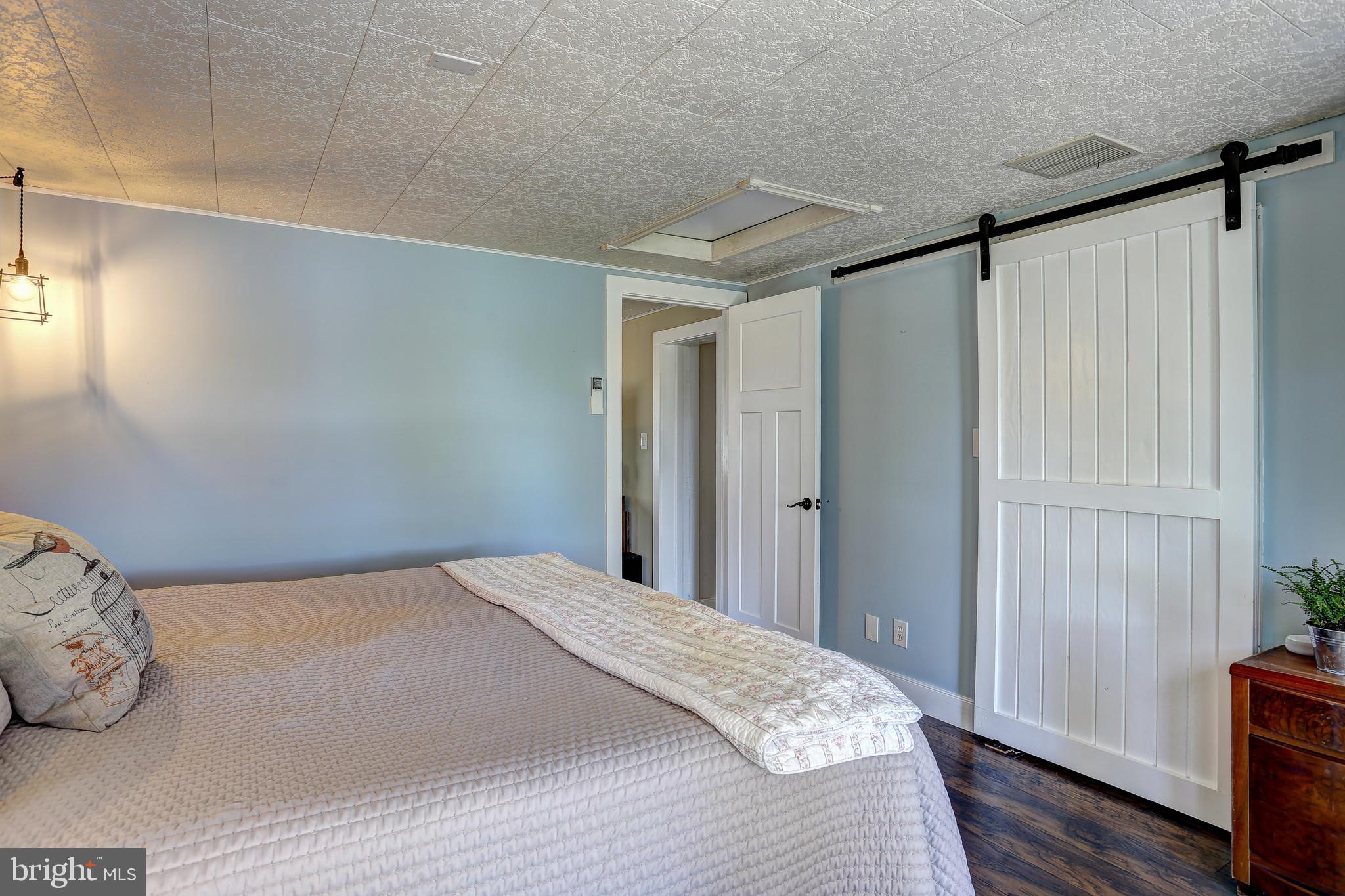 2016 Poplar Ridge Road Pasadena, MD 21122 - Photo 24 of 34 Owners' bedroom with "barn" closet door