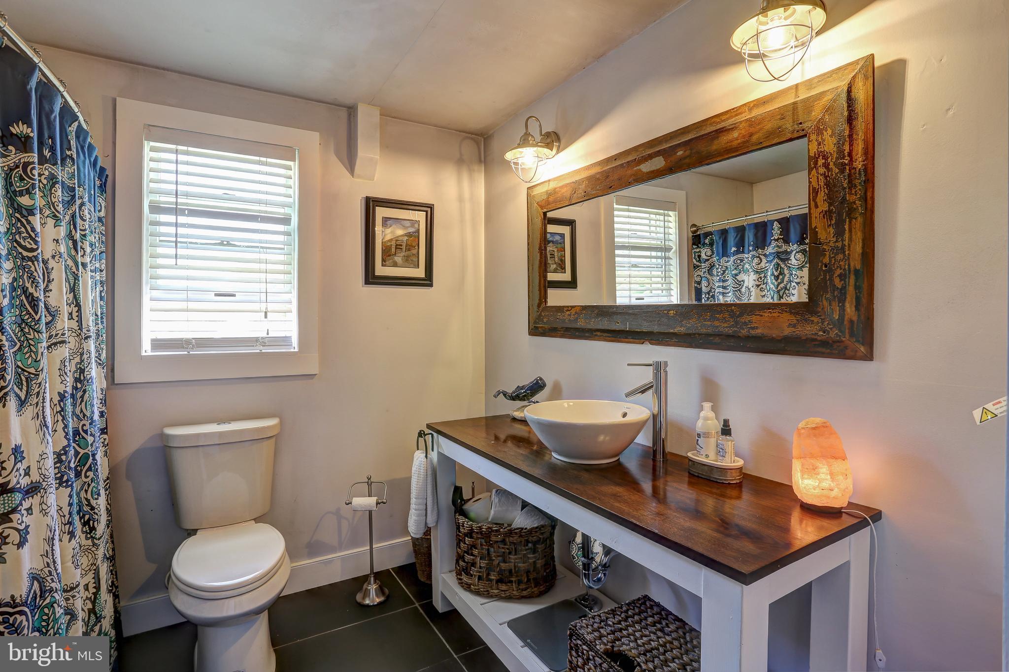 2016 Poplar Ridge Road Pasadena, MD 21122 - Photo 25 of 34 Bath vanity and antique mirror
