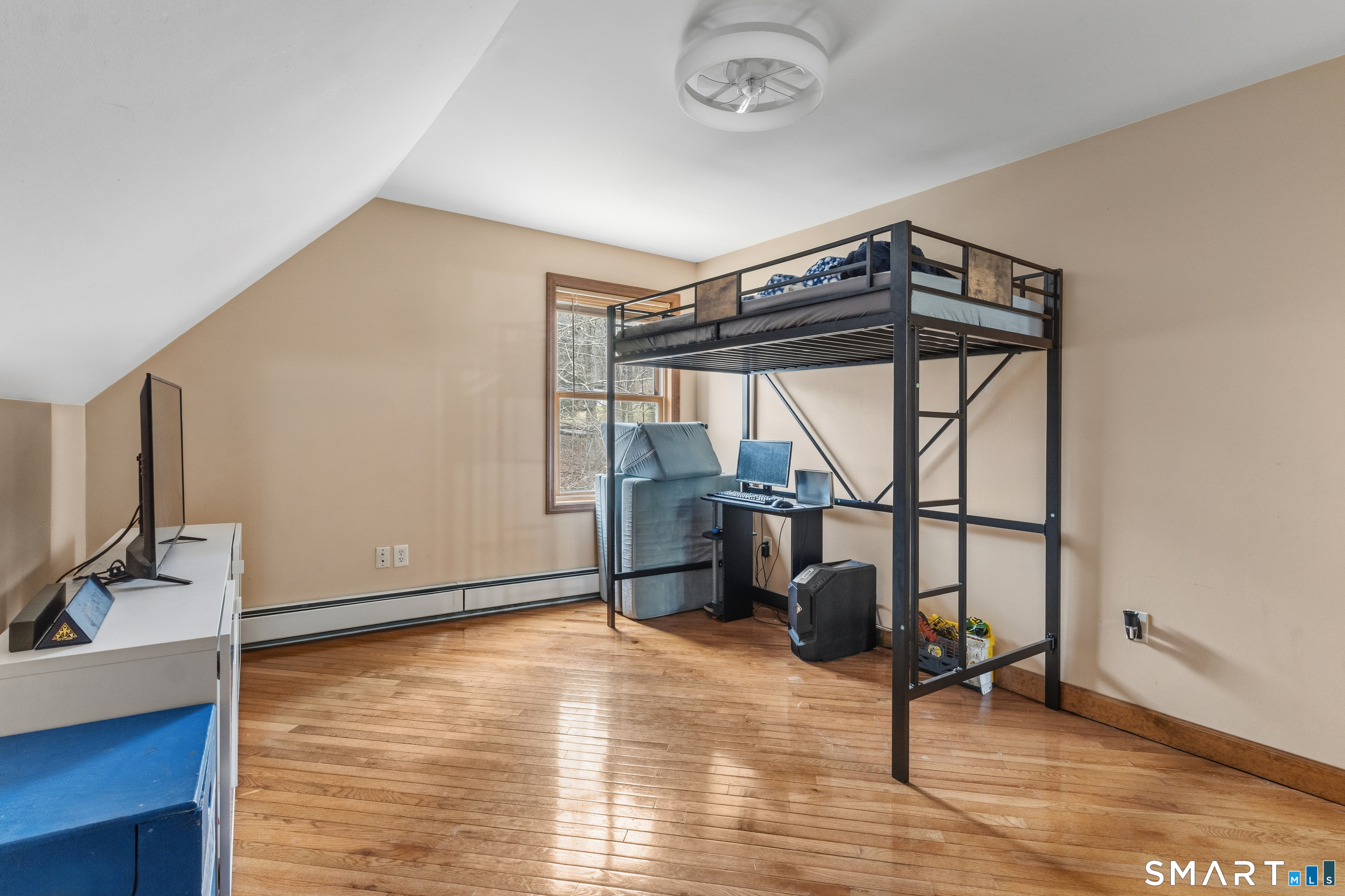 120 Hanover Versailles Road Sprague, CT 06330 - Photo 15 of 26 a view of a room with gym equipment and a window