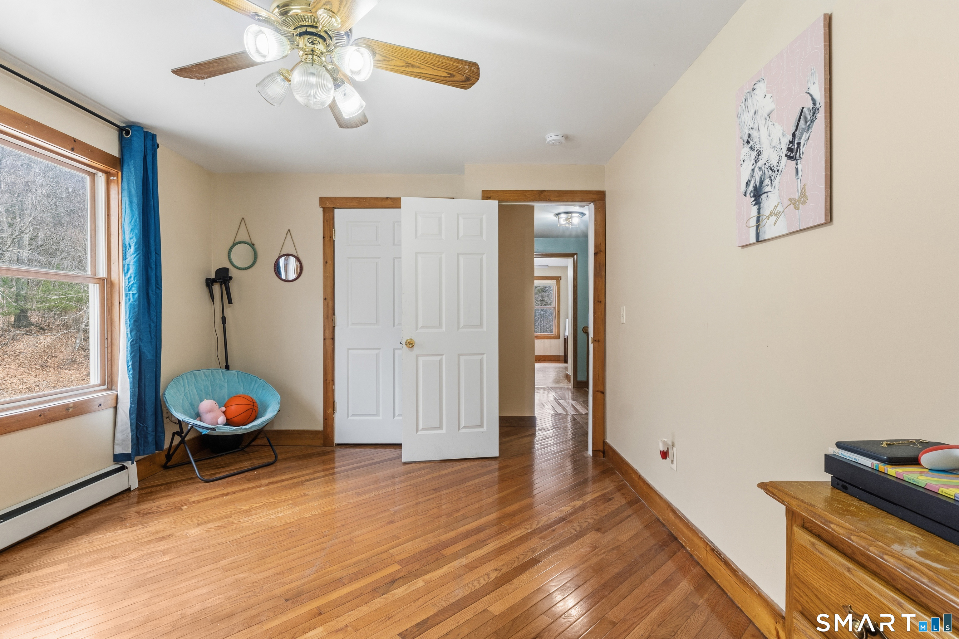 120 Hanover Versailles Road Sprague, CT 06330 - Photo 18 of 26 workspace with wooden floor fan and windows