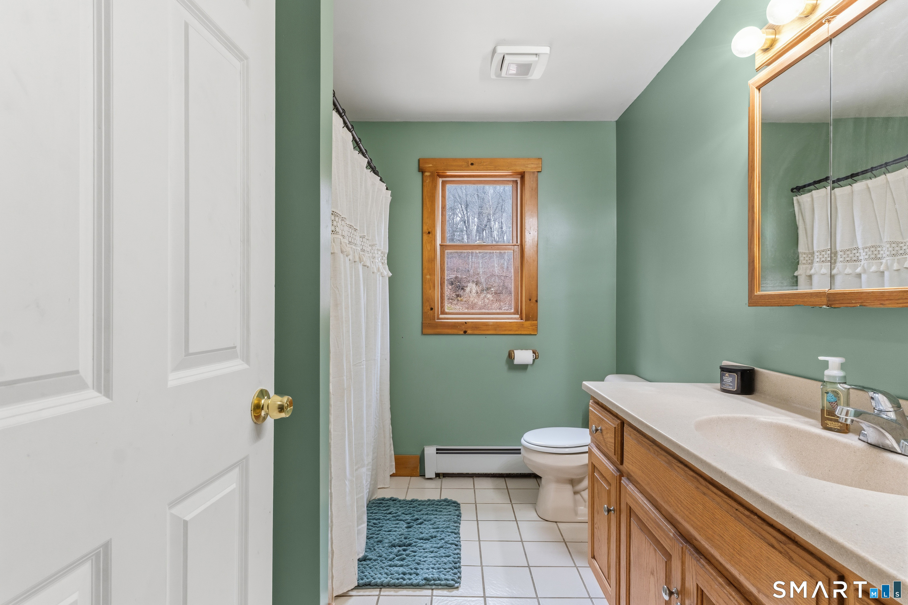 120 Hanover Versailles Road Sprague, CT 06330 - Photo 19 of 26 a bathroom with a sink toilet and shower