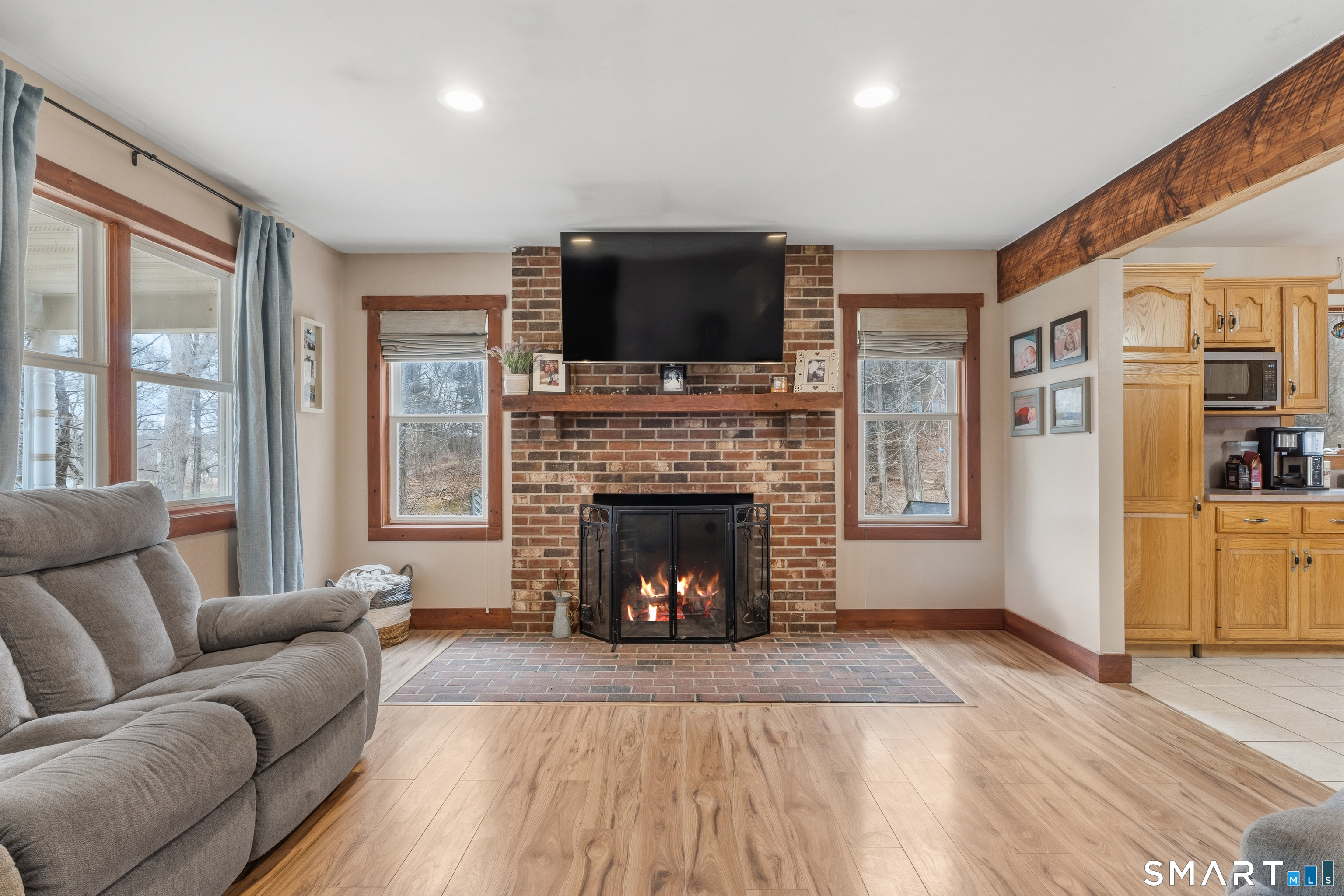 120 Hanover Versailles Road Sprague, CT 06330 - Photo 5 of 26 a living room with furniture fireplace and flat screen tv