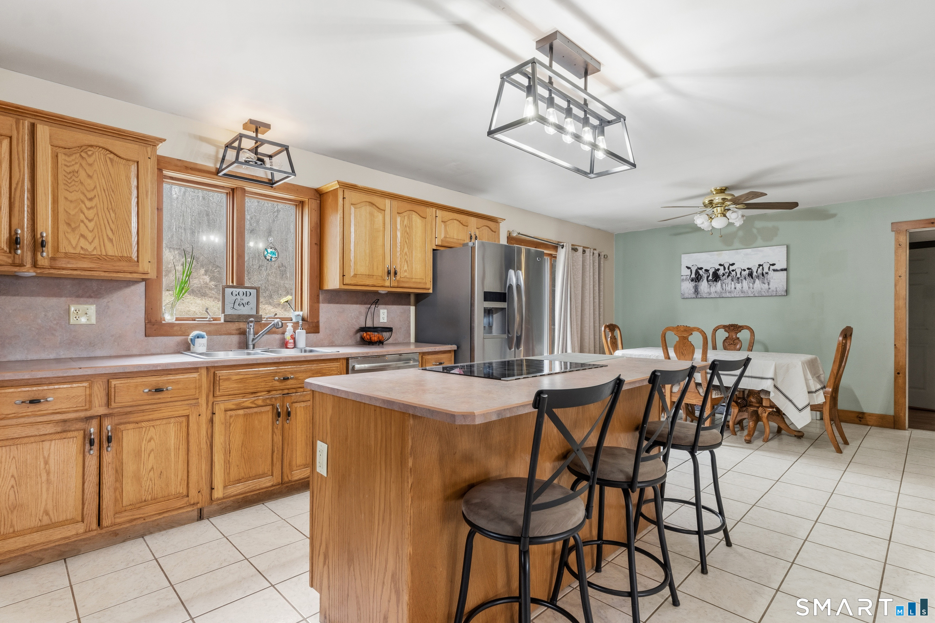120 Hanover Versailles Road Sprague, CT 06330 - Photo 6 of 26 a view of a dining room with furniture window and wooden floor