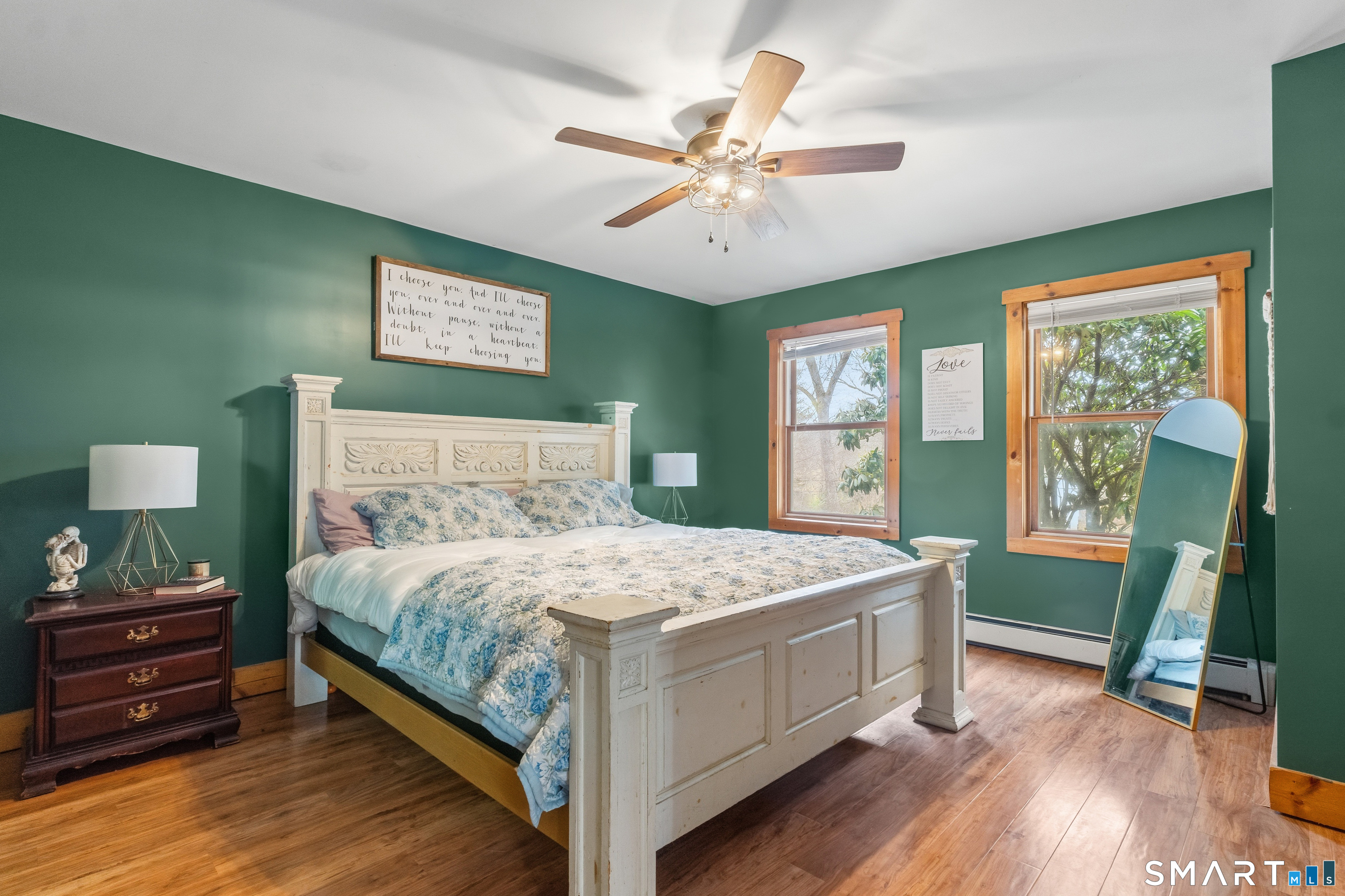 120 Hanover Versailles Road Sprague, CT 06330 - Photo 10 of 26 a bedroom with a bed a chandelier and a window