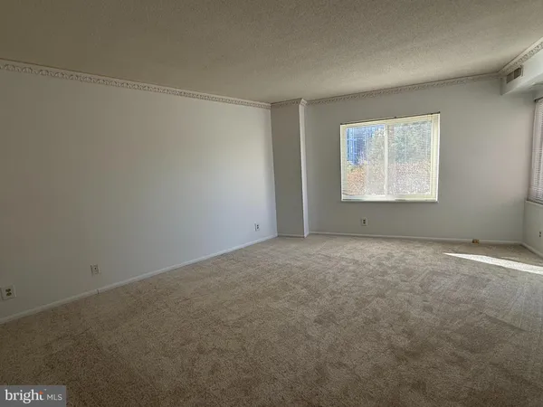 a view of a room with an entryway