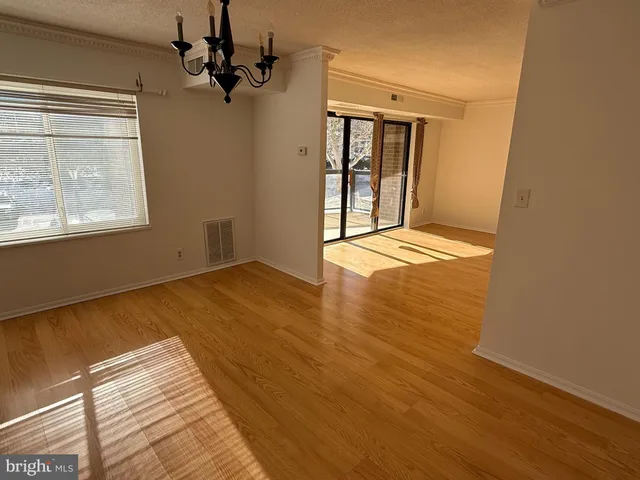 a view of a livingroom with a staircase