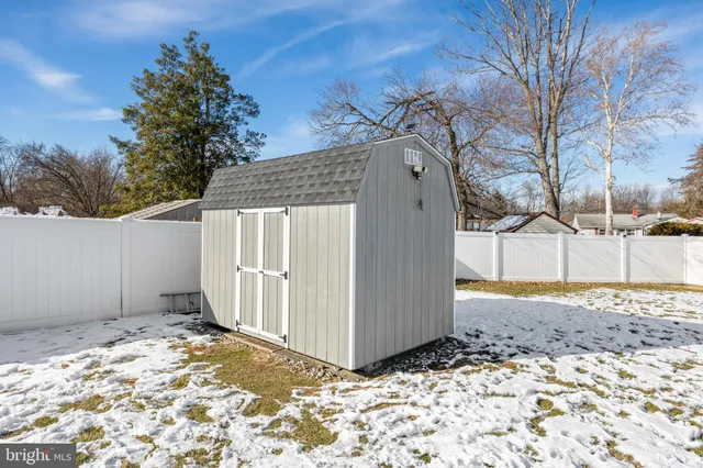 a view of a backyard of the house