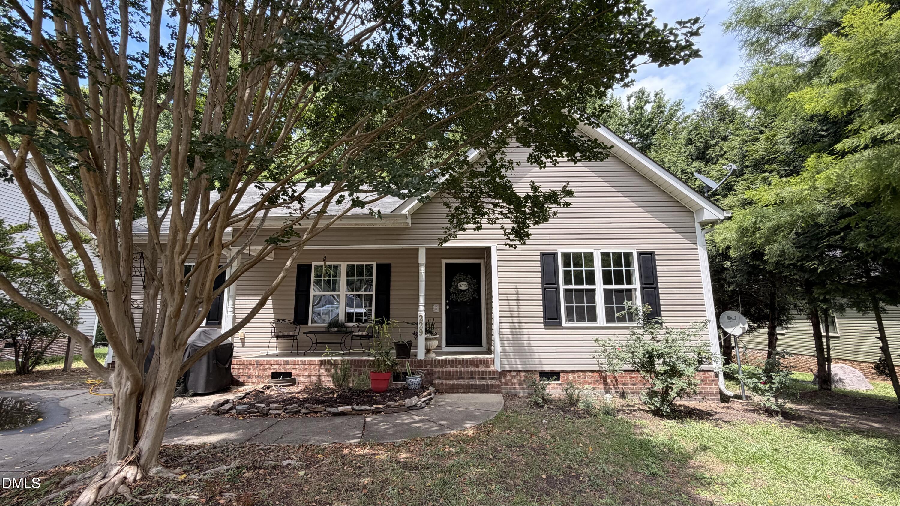 229 Sterling Way Angier, NC 27501 - Photo 1 of 10 a view of a house with a yard