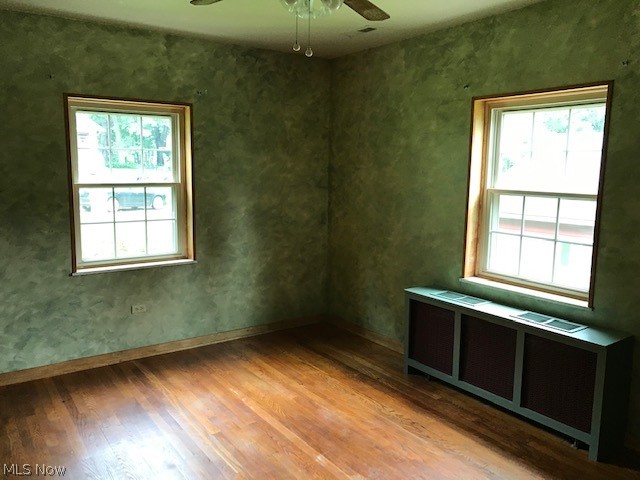 1283 Center Road Clinton, OH 44216 - Photo 17 of 33 BEDRM 1 - HARDWOOD FLRG - CEILING FAN