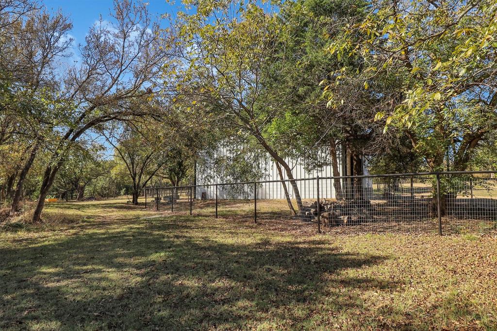 2601 Randell Lake Road Denison, TX 75020 - Photo 21 of 40 a view of yard with trees