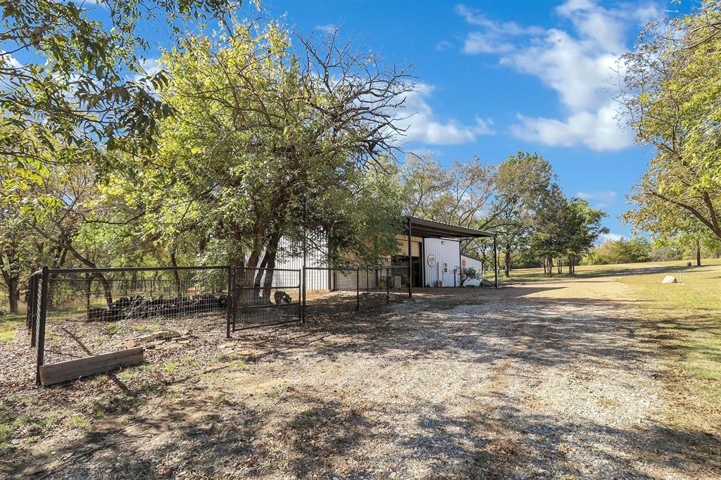 2601 Randell Lake Road Denison, TX 75020 - Photo 22 of 40 a view of a house with a yard