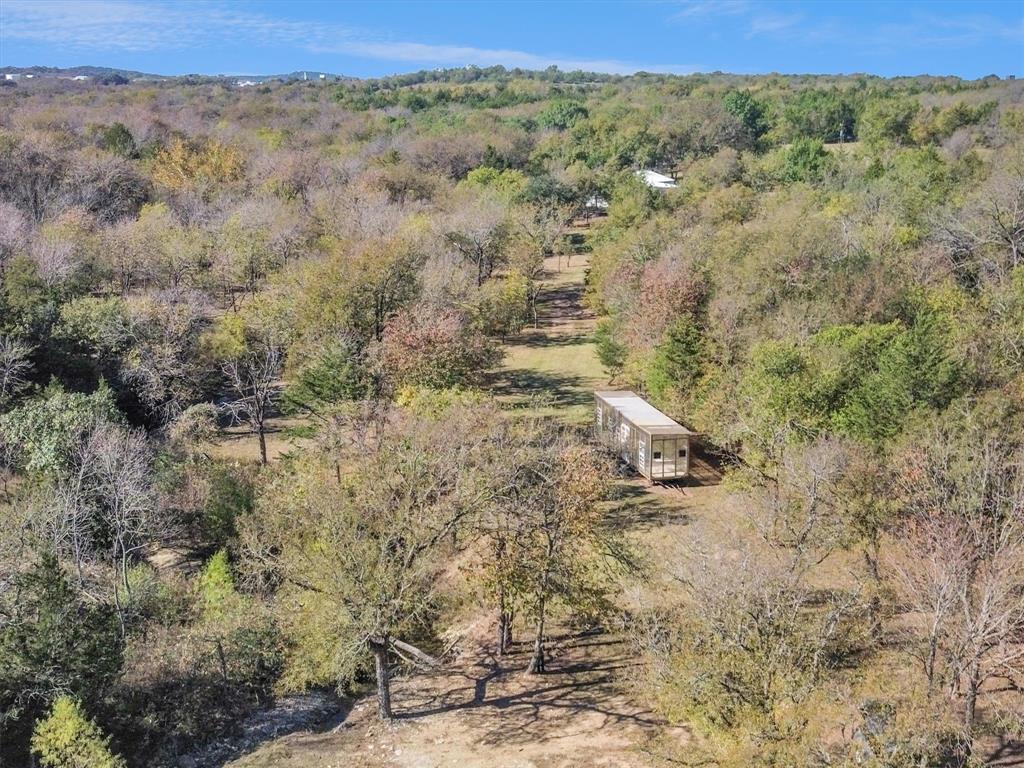 2601 Randell Lake Road Denison, TX 75020 - Photo 36 of 40 a view of a field with trees in the background