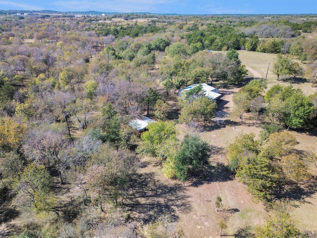 2601 Randell Lake Road Denison, TX 75020 - Photo 38 of 40 a view of a forest with a street