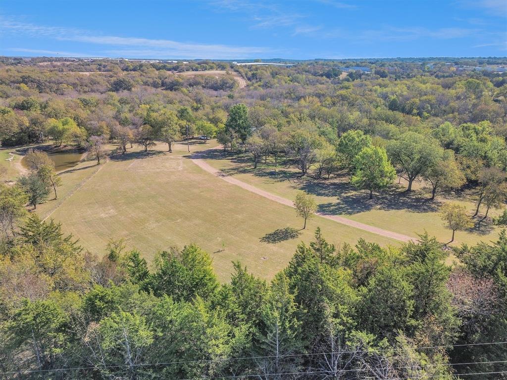 2601 Randell Lake Road Denison, TX 75020 - Photo 5 of 40 a view of a lake with a mountain