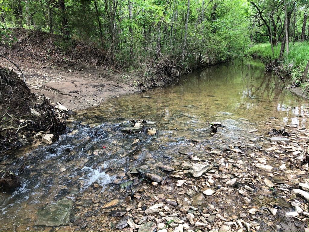 2601 Randell Lake Road Denison, TX 75020 - Photo 7 of 40 a view of a lake with houses